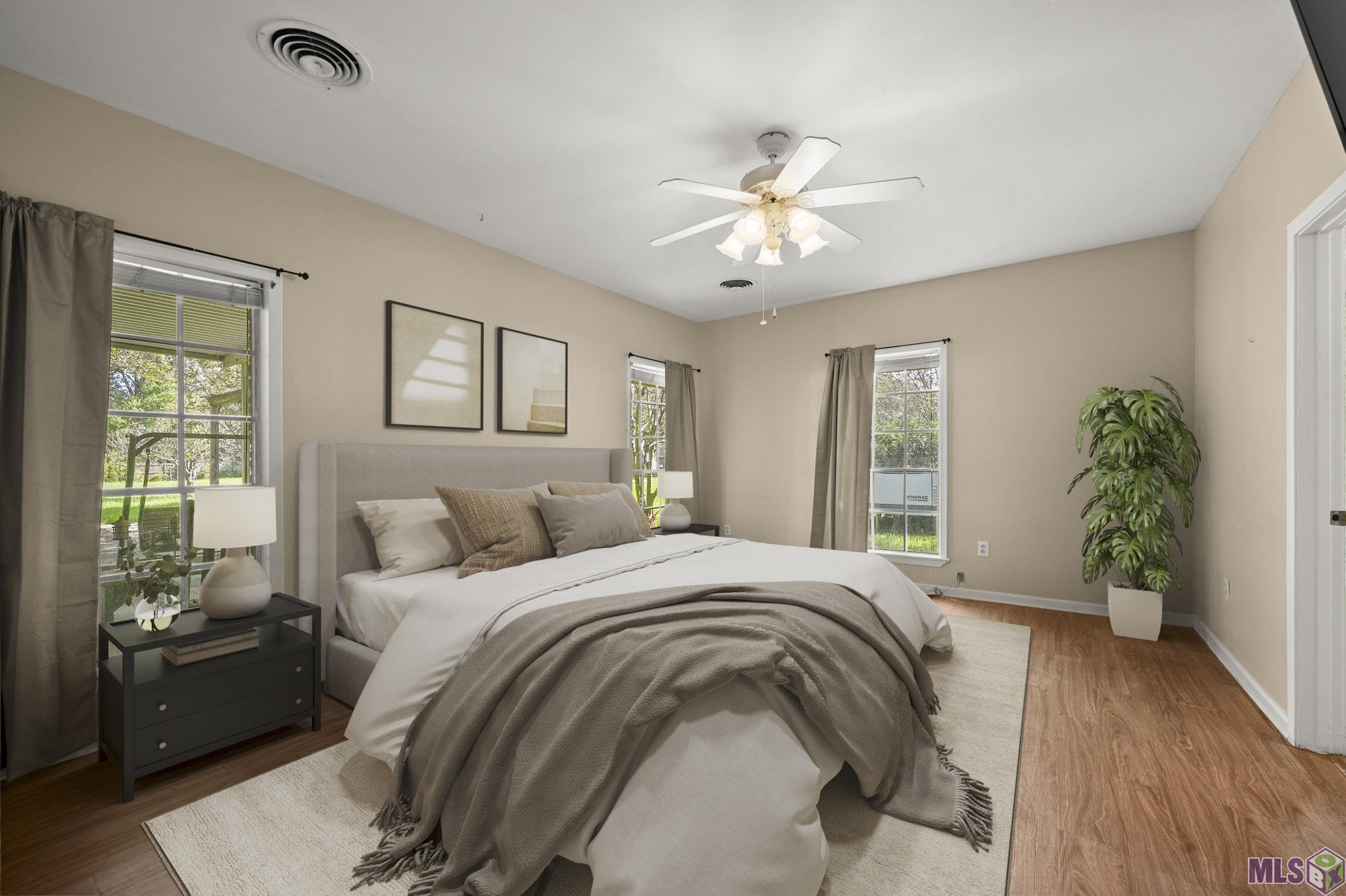 405 North College Street Denham Springs, LA 70726 - Photo 21 of 39 Primary with furniture