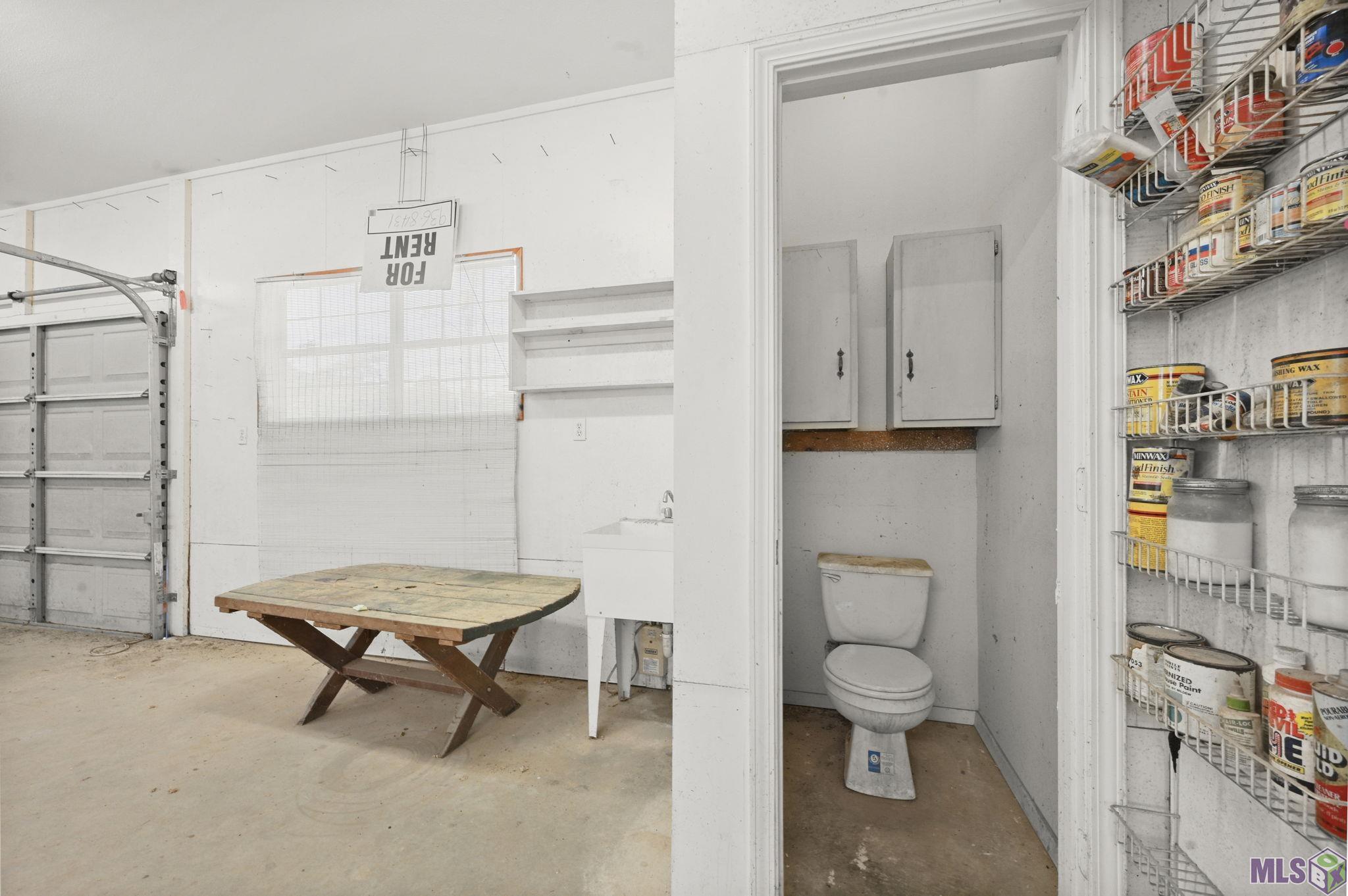 405 North College Street Denham Springs, LA 70726 - Photo 29 of 39 GArage/Workshop1/2 bath