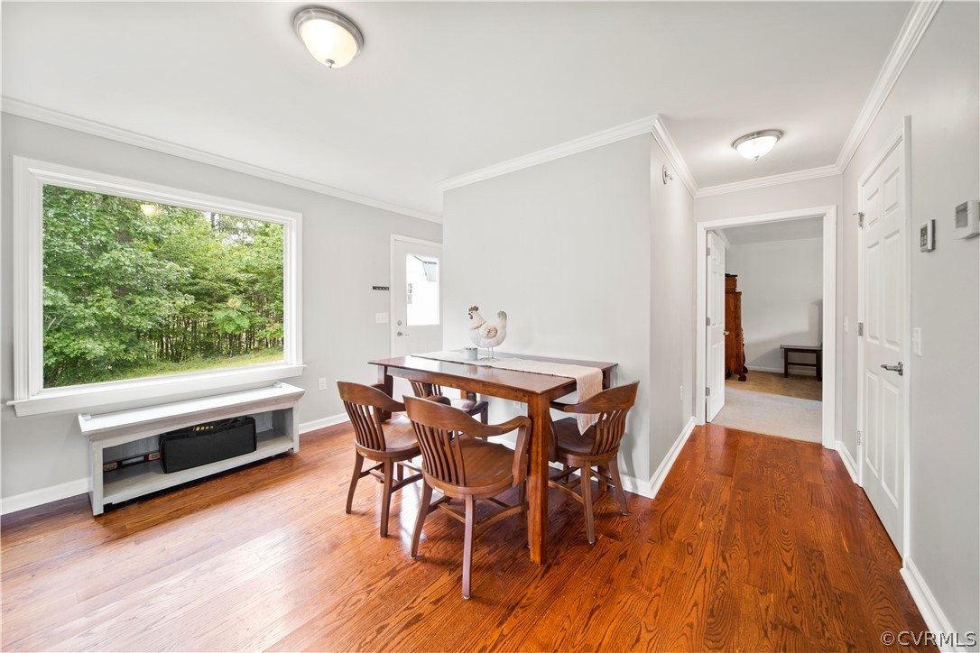 2577 Pleasant Oak Road Victoria, VA 23974 - Photo 15 of 38 a view of a dining room with furniture window and wooden floor