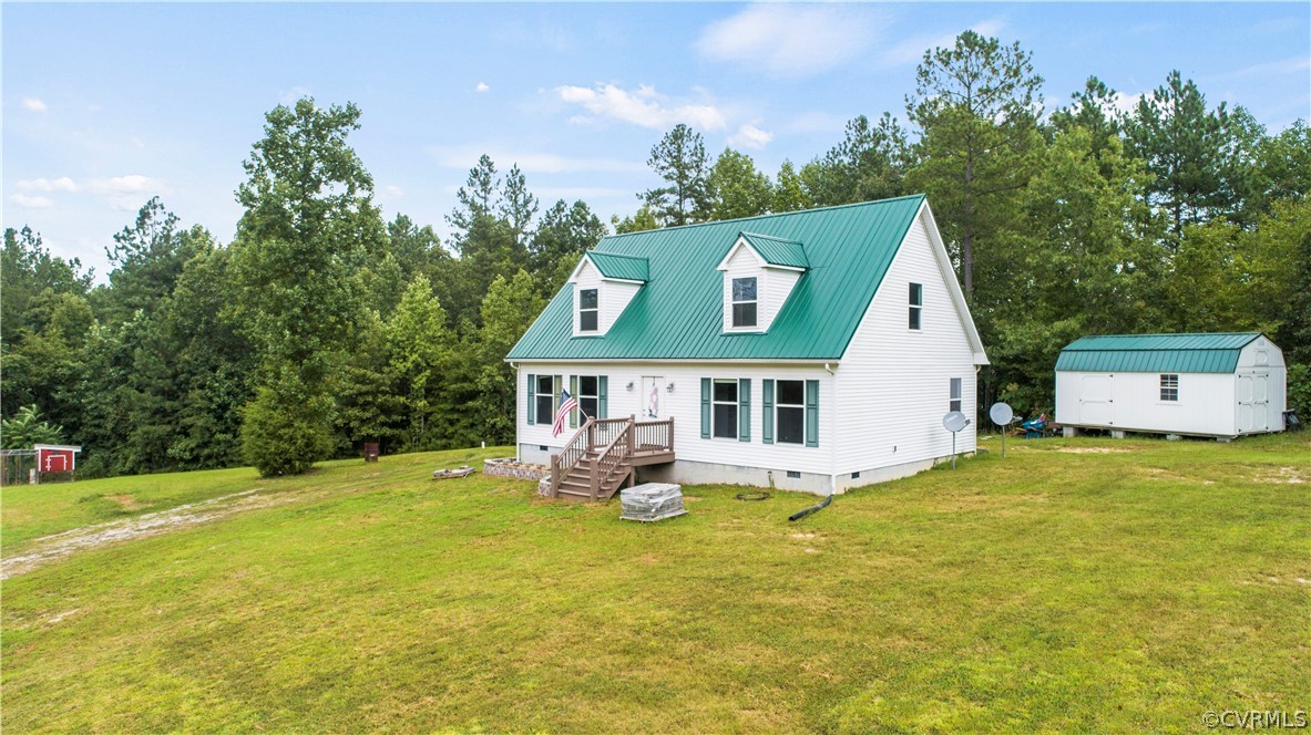 2577 Pleasant Oak Road Victoria, VA 23974 - Photo 2 of 38 a front view of a house with garden