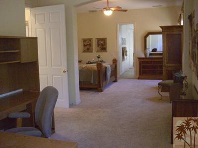 303 Loch Lomond Road Rancho Mirage, CA 92270 - Photo 14 of 25 a living room with furniture and a bathroom
