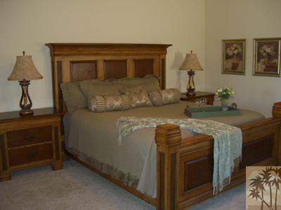 303 Loch Lomond Road Rancho Mirage, CA 92270 - Photo 16 of 25 a living room with a bed and furniture