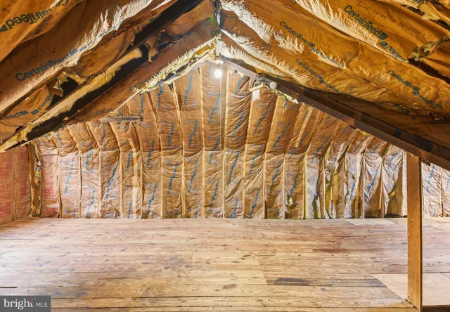 a view of a chairs and table in patio