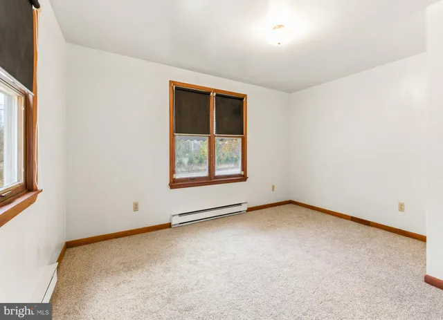 a view of a room with a sink and a window
