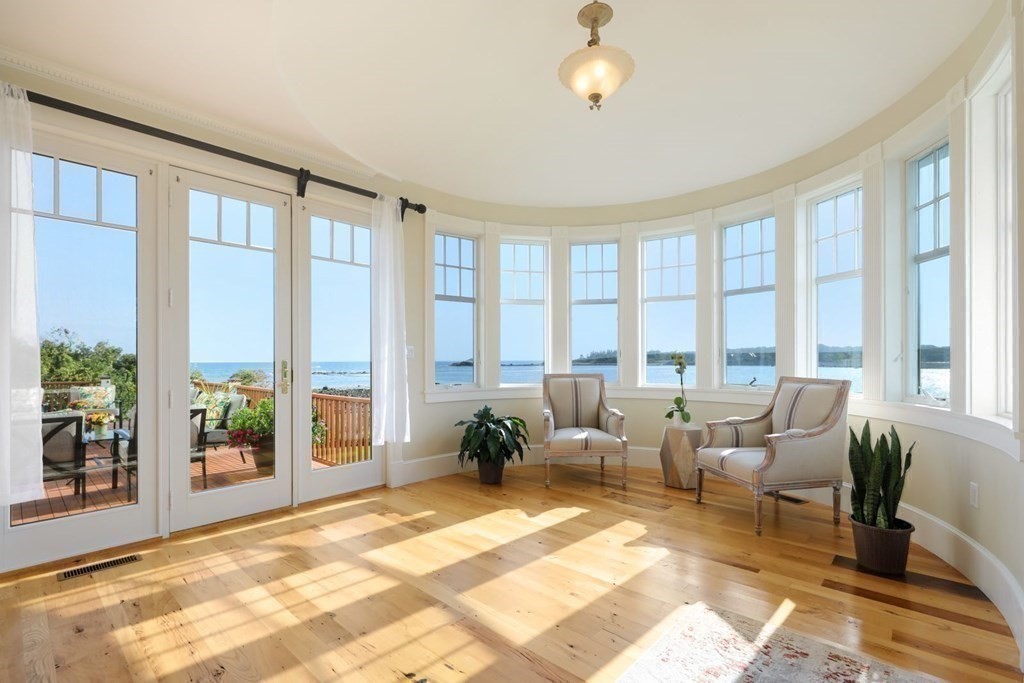 284 Atlantic Road Gloucester, MA 01930 - Photo 15 of 41 a living room with furniture and floor to ceiling windows