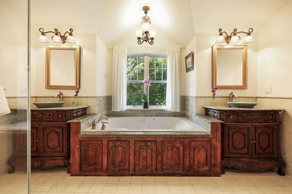 284 Atlantic Road Gloucester, MA 01930 - Photo 16 of 41 a bathroom with a tub sink and mirror