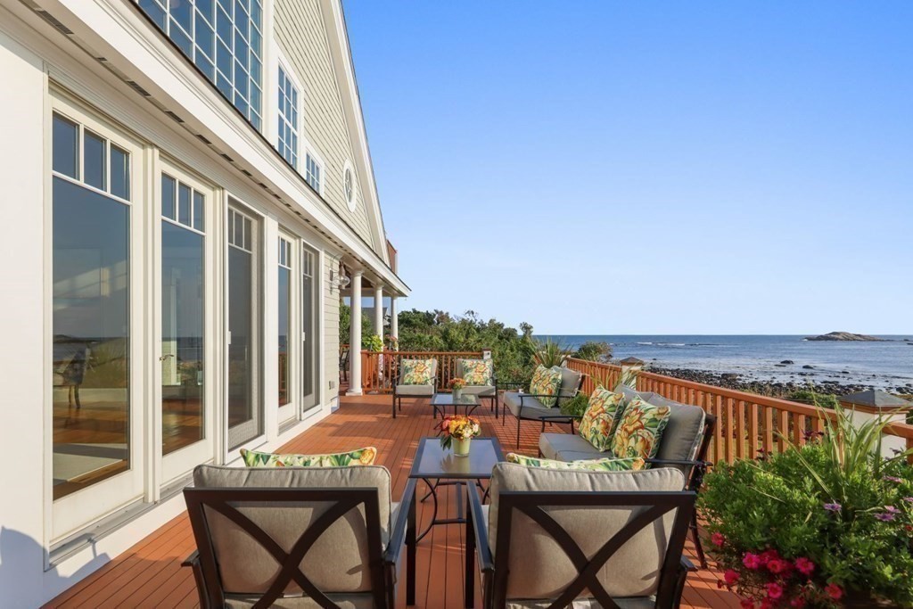 284 Atlantic Road Gloucester, MA 01930 - Photo 27 of 41 a view of a patio with furniture and a potted plant