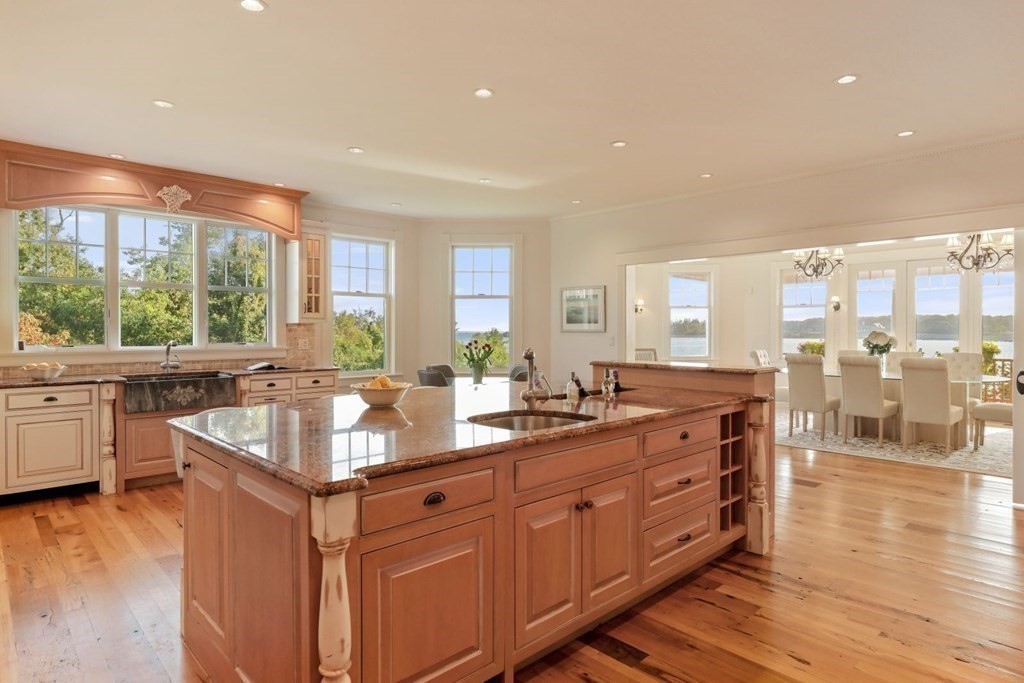 284 Atlantic Road Gloucester, MA 01930 - Photo 10 of 41 a kitchen with lots of counter top space and wooden floor
