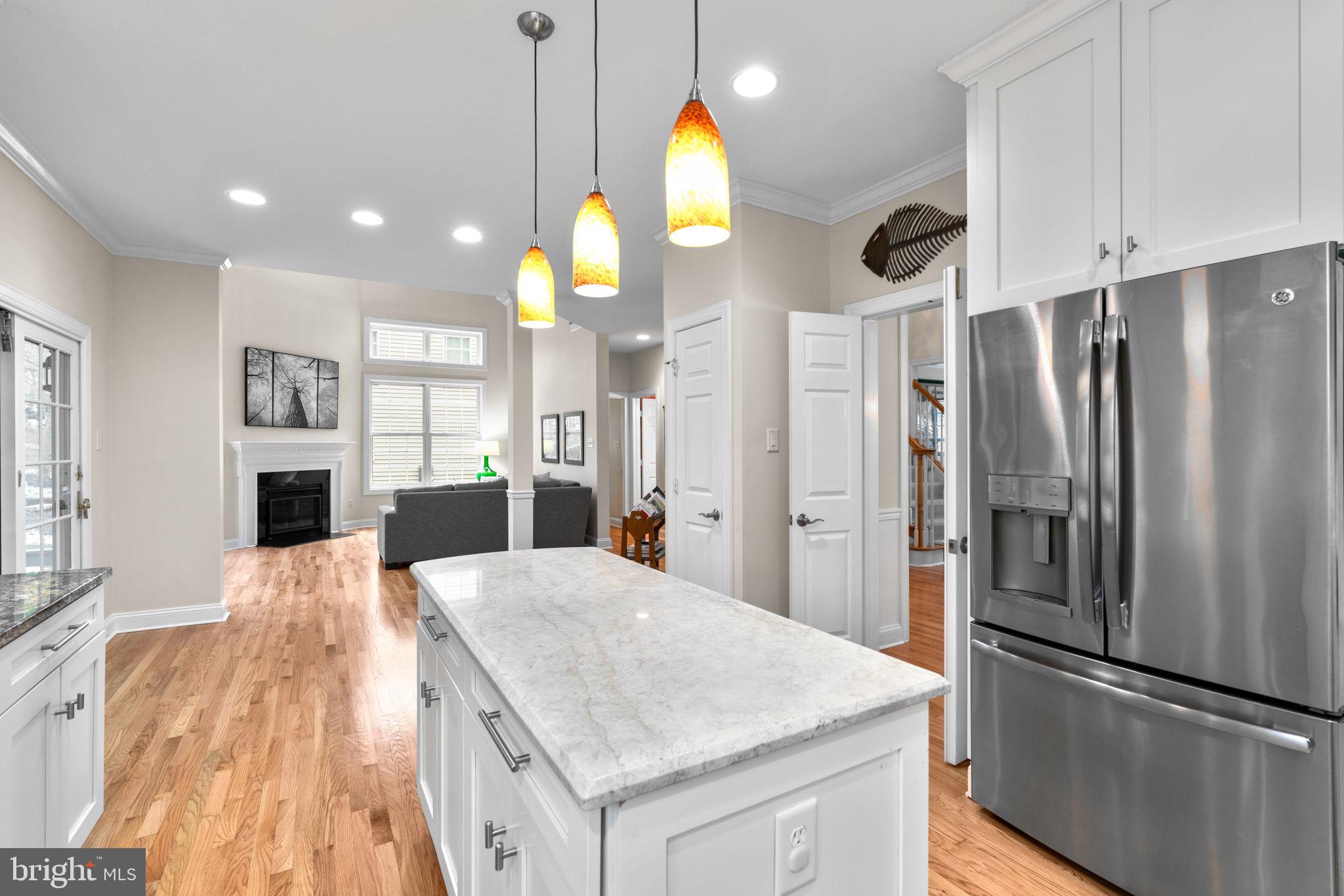 6429 Empty Song Road Columbia, MD 21044 - Photo 14 of 54 a kitchen with stainless steel appliances granite countertop a refrigerator a oven and a sink