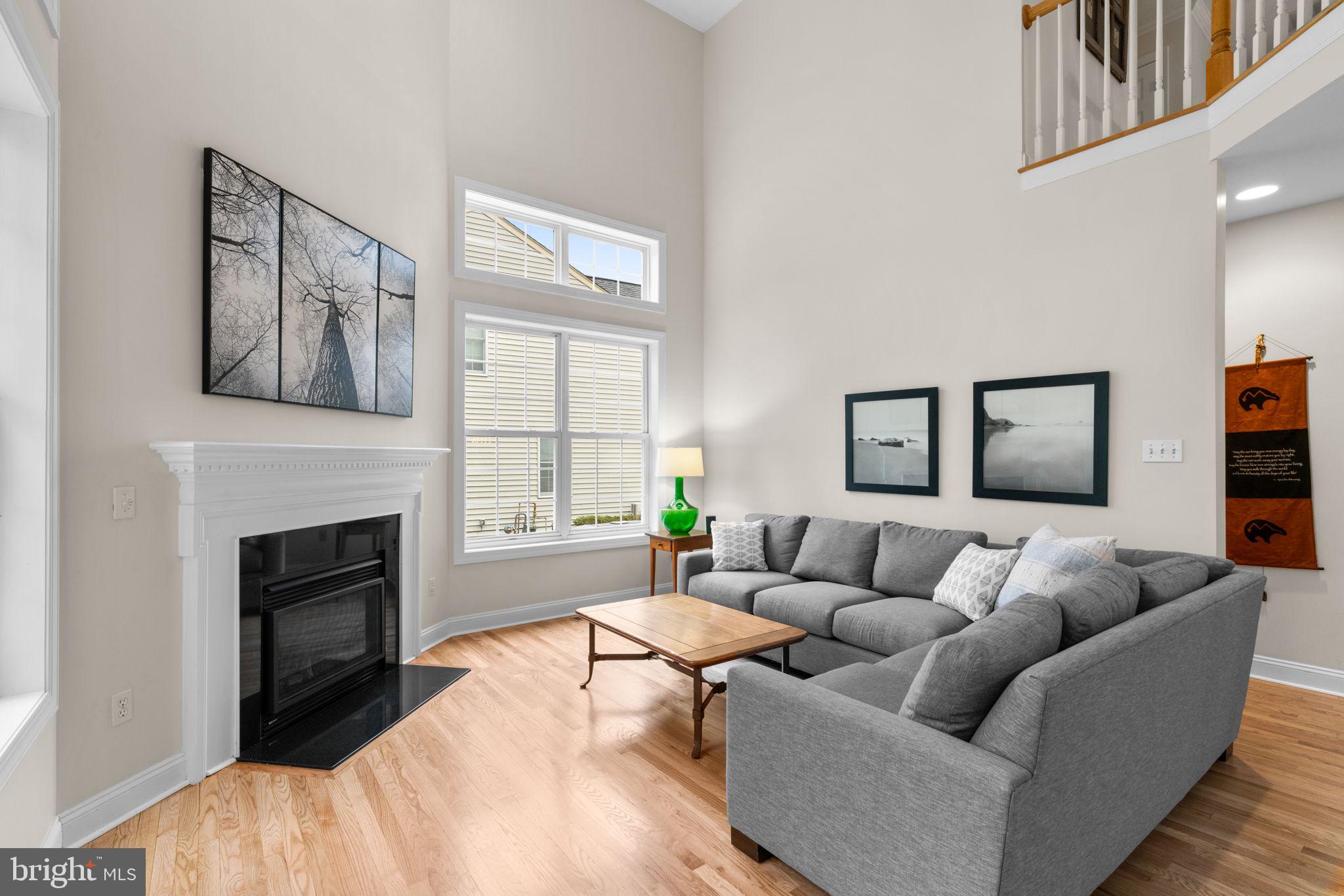 6429 Empty Song Road Columbia, MD 21044 - Photo 17 of 54 a living room with furniture and a fireplace