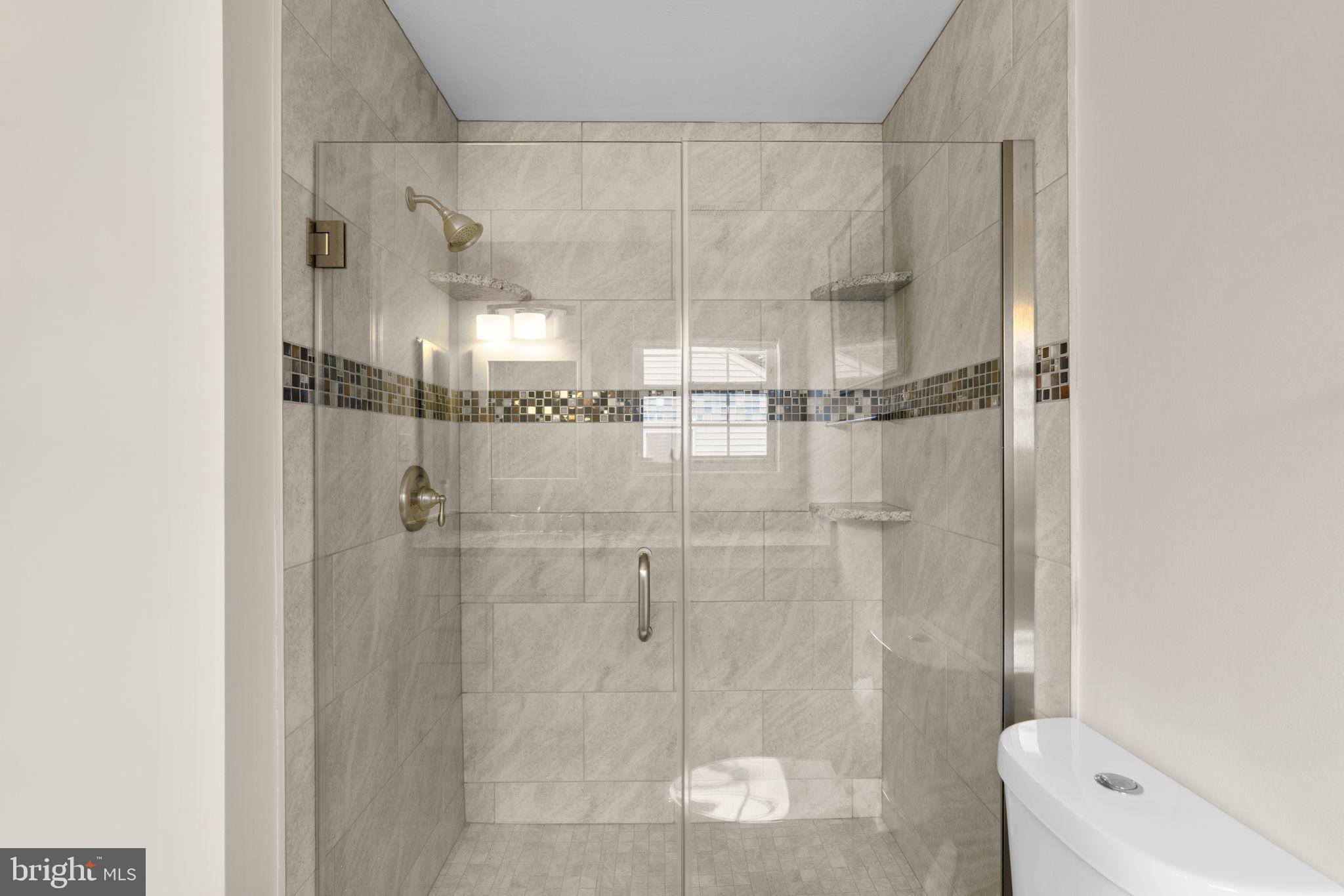 6429 Empty Song Road Columbia, MD 21044 - Photo 28 of 54 a bathroom with a shower