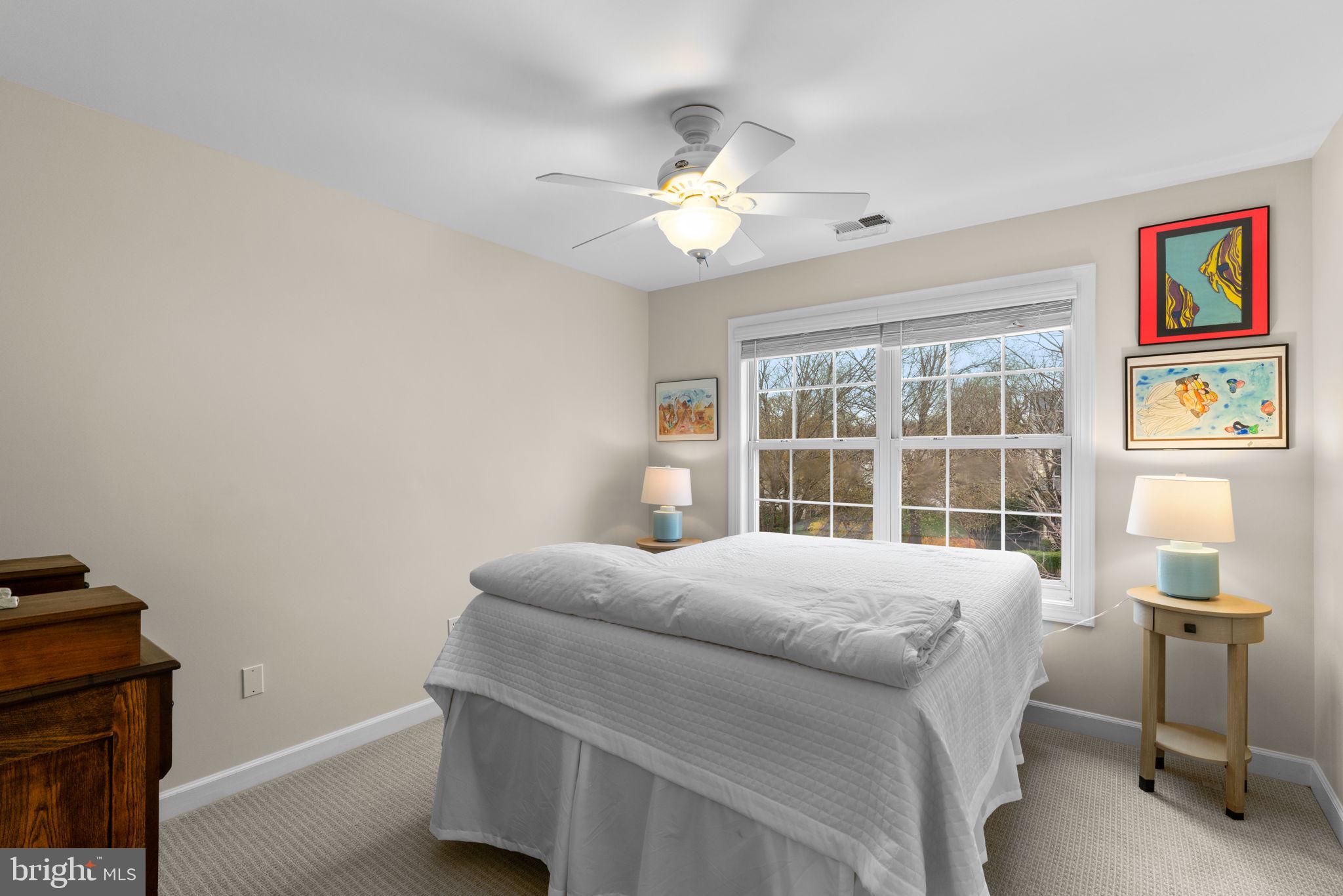 6429 Empty Song Road Columbia, MD 21044 - Photo 29 of 54 a bedroom with a bed and a window