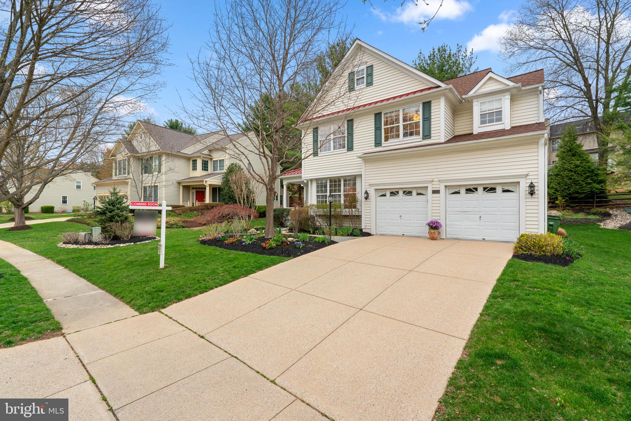 6429 Empty Song Road Columbia, MD 21044 - Photo 3 of 54 a view of a white house with a yard