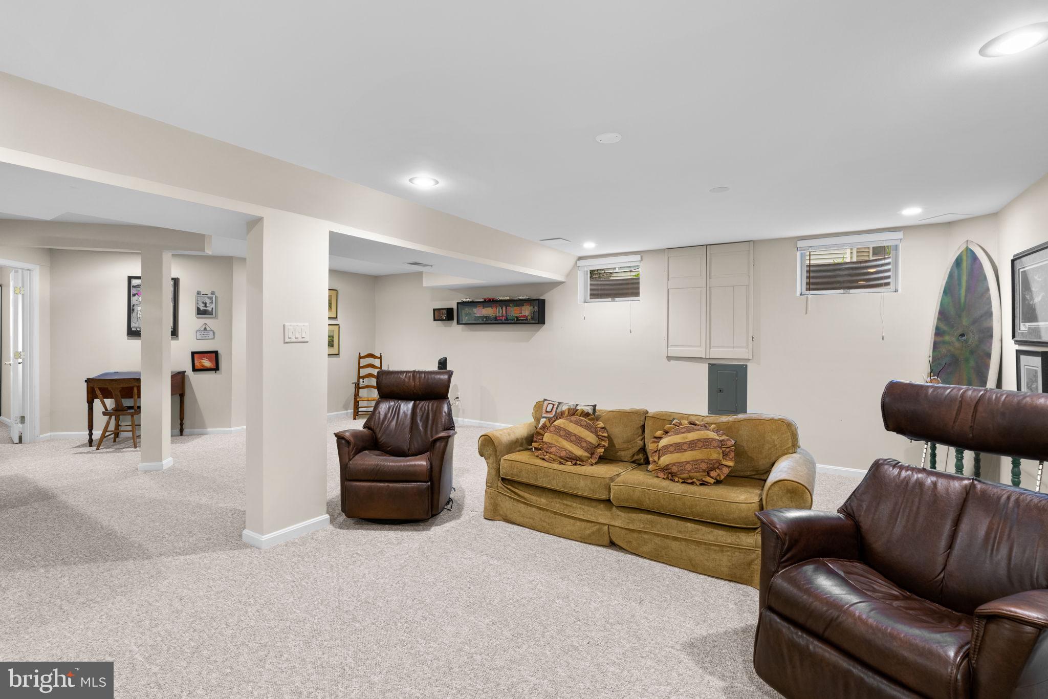 6429 Empty Song Road Columbia, MD 21044 - Photo 33 of 54 a living room with furniture and a couch