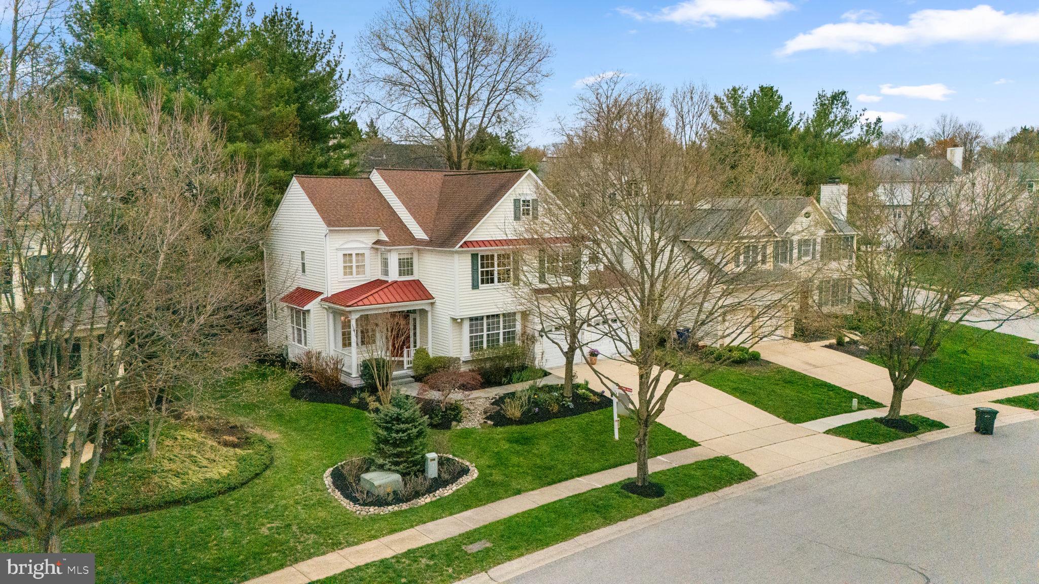 6429 Empty Song Road Columbia, MD 21044 - Photo 45 of 54 a front view of a house with garden