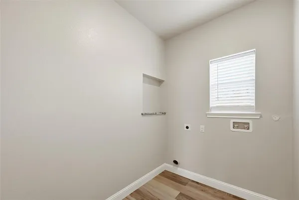 a view of a room that has a window in it