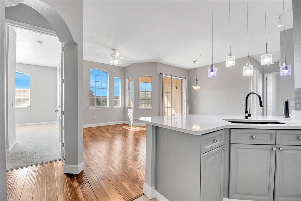617 Terrace Ridge Circle, Unit 617 Davenport, FL 33896 - Photo 12 of 40 a view of a bathroom with a sink and mirror