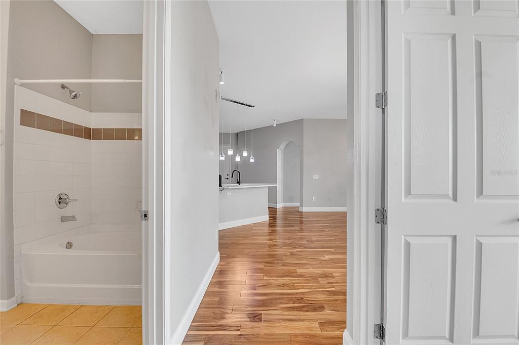 617 Terrace Ridge Circle, Unit 617 Davenport, FL 33896 - Photo 14 of 40 a view of a hallway with wooden floor and staircase