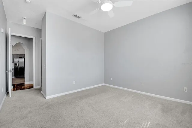 an empty room with a bathroom