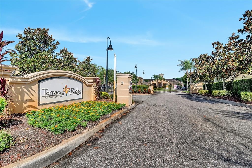 617 Terrace Ridge Circle, Unit 617 Davenport, FL 33896 - Photo 40 of 40 a view of a street with a sign board