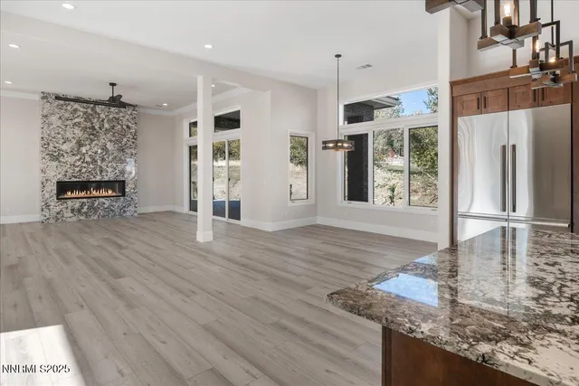 a view of a kitchen from the hallway
