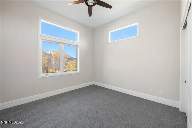 an empty room with a bathroom