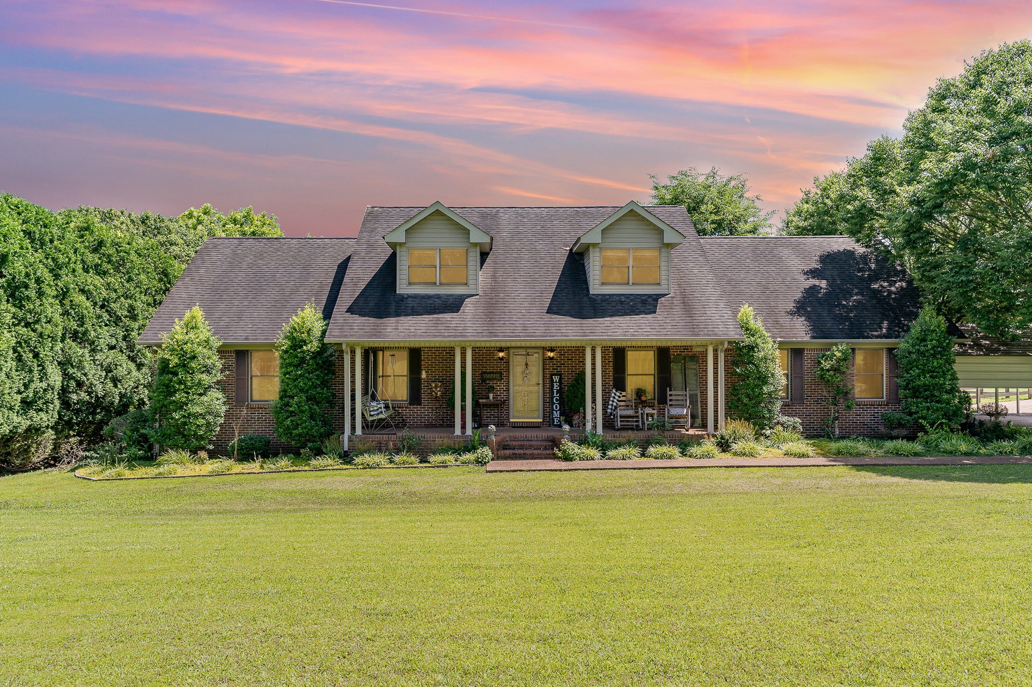 4360 Scott Hollow Road Culleoka, TN 38451 - Photo 1 of 27 a front view of building with yard and green space
