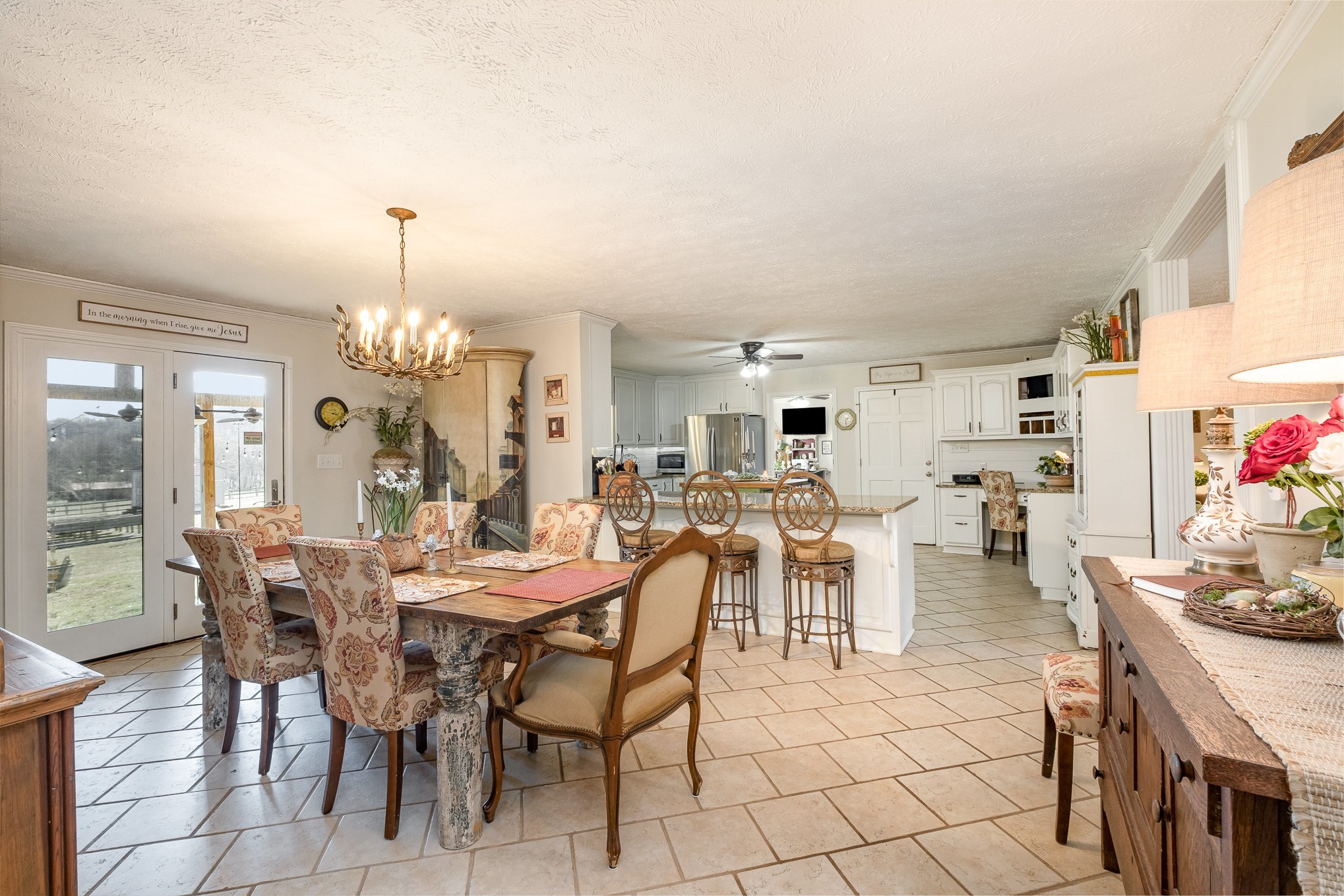 4360 Scott Hollow Road Culleoka, TN 38451 - Photo 10 of 27 a view of a dining room with furniture and chandelier