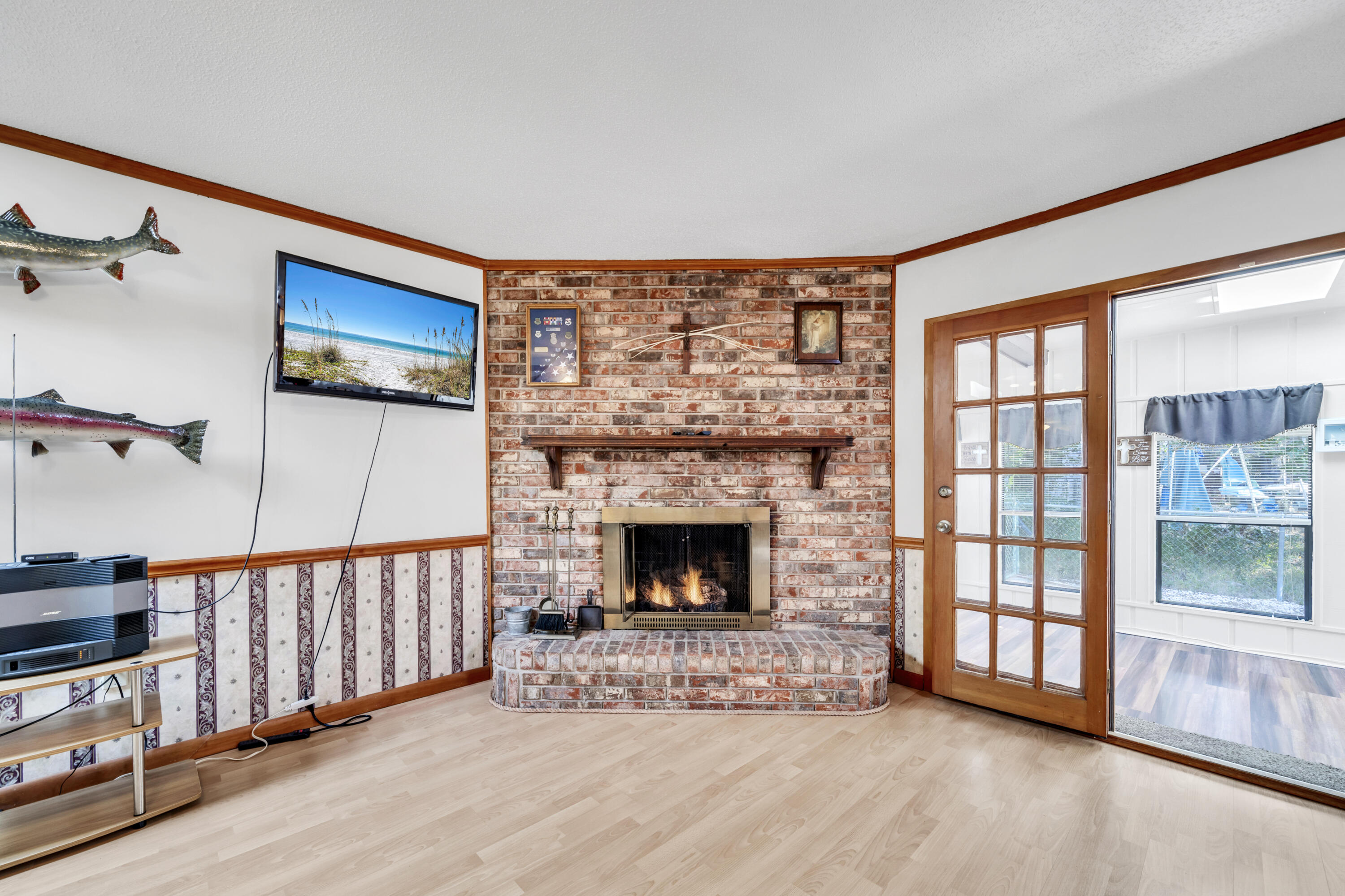32 Walnut Avenue Shalimar, FL 32579 - Photo 20 of 56 a view of an empty room with wooden floor and a window