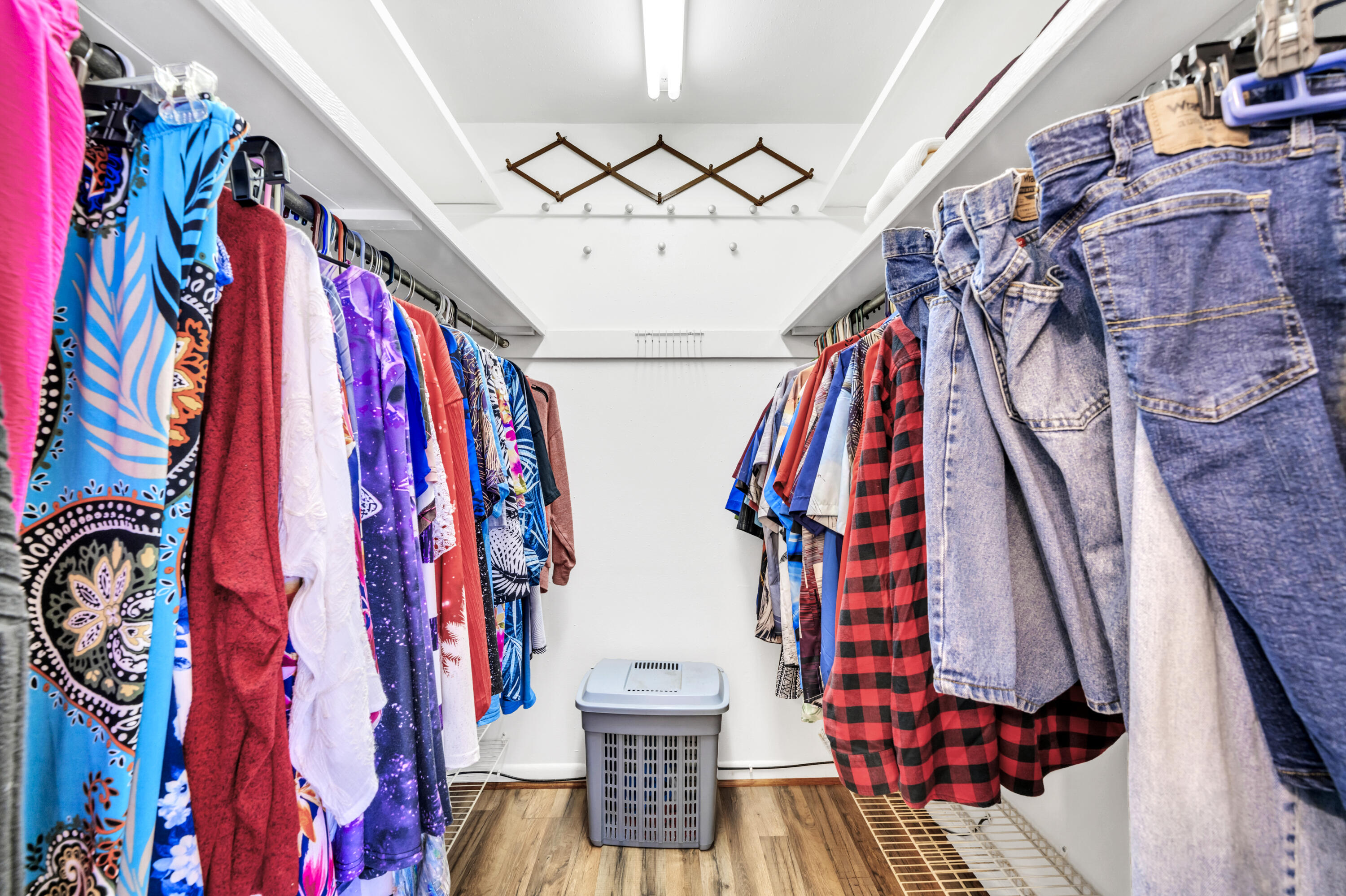 32 Walnut Avenue Shalimar, FL 32579 - Photo 26 of 56 a view of walk in closet with clothes and shoes