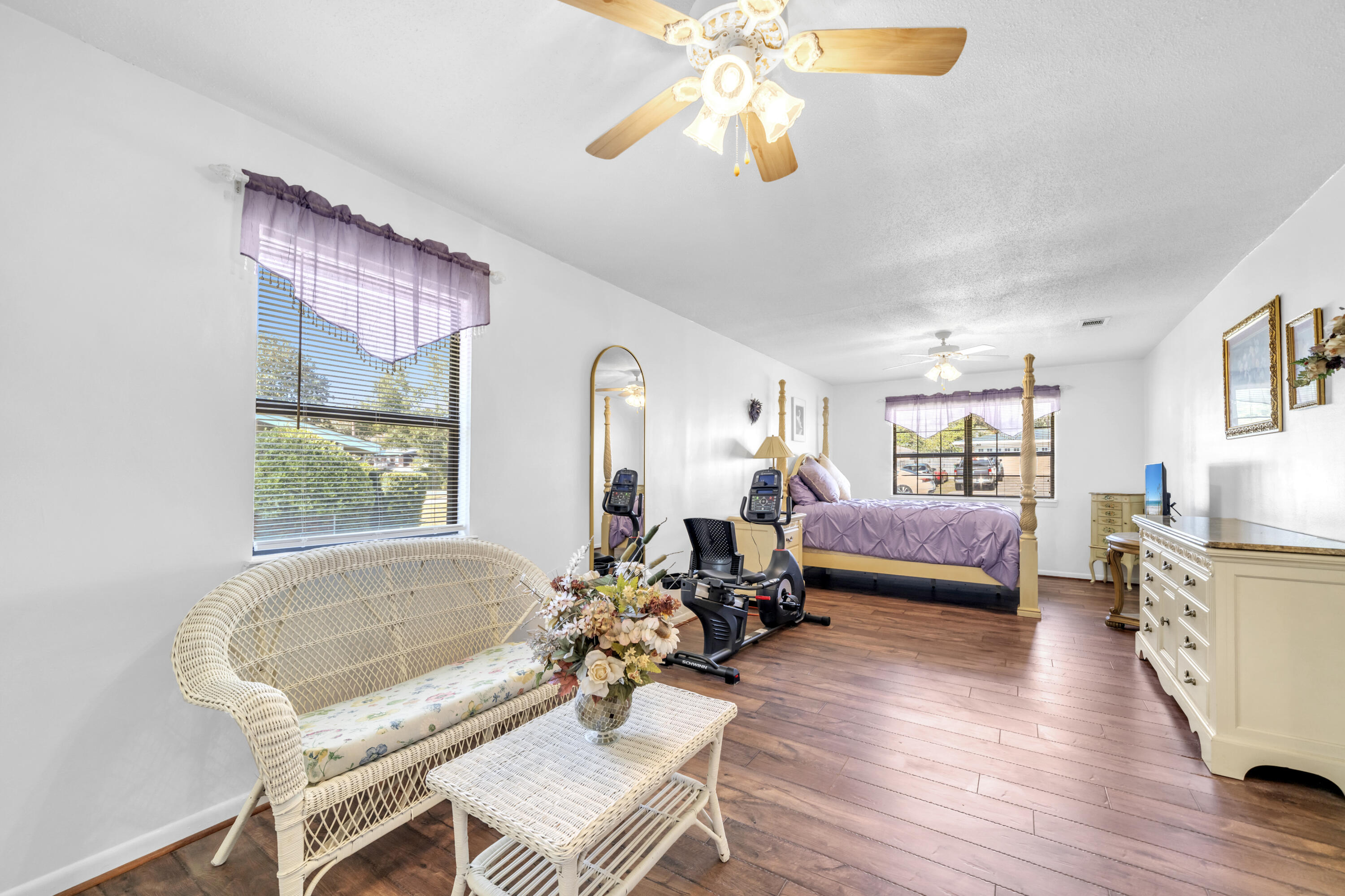 32 Walnut Avenue Shalimar, FL 32579 - Photo 28 of 56 a bedroom with furniture and a wooden floor