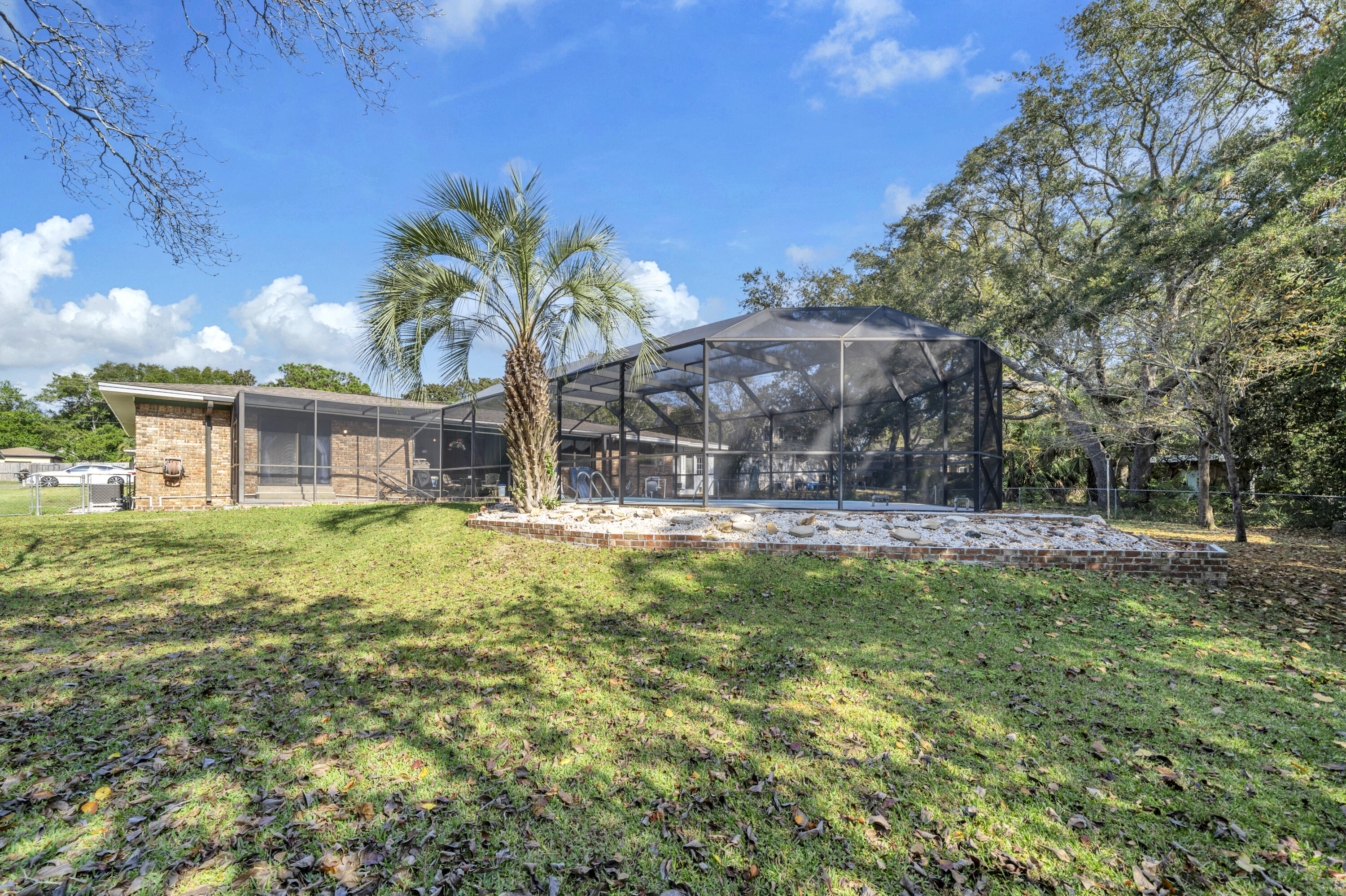 32 Walnut Avenue Shalimar, FL 32579 - Photo 39 of 56 a front view of house with yard and seating area
