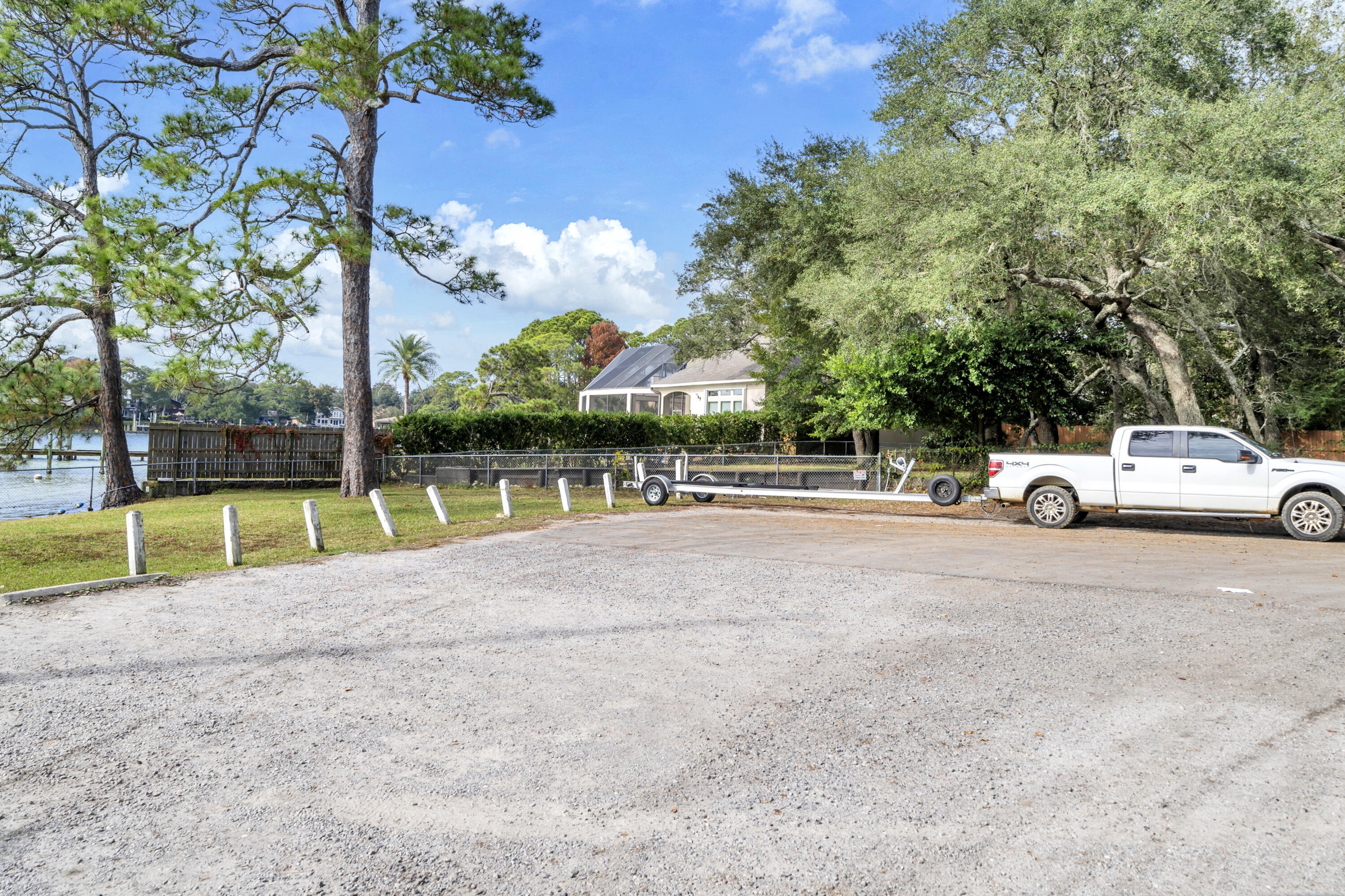 32 Walnut Avenue Shalimar, FL 32579 - Photo 44 of 56 a view of a street with a car park side of the road