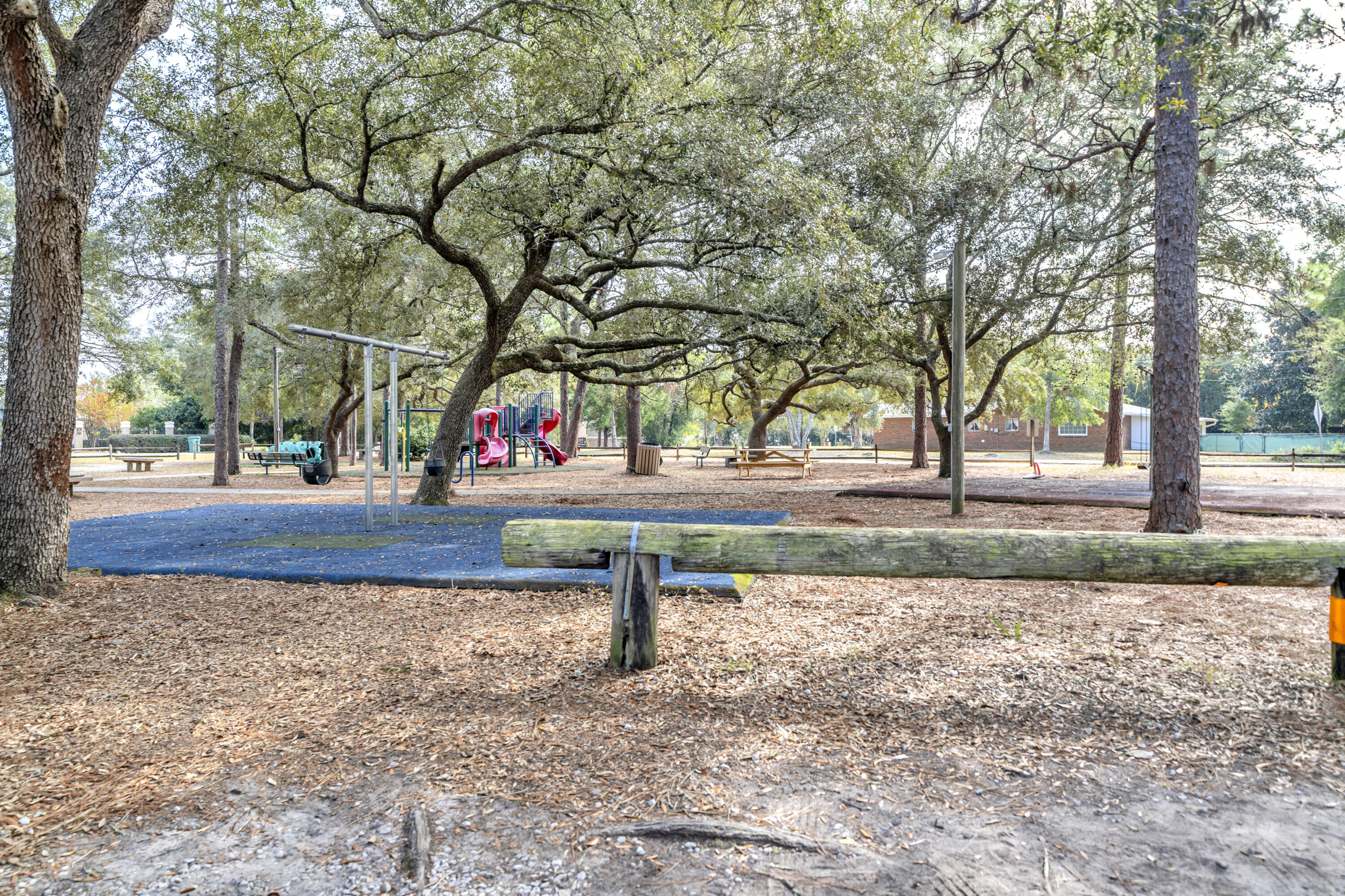 32 Walnut Avenue Shalimar, FL 32579 - Photo 46 of 56 a sign board with yard in the back