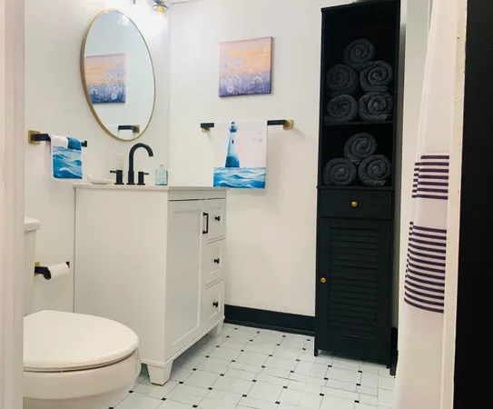 a bathroom with a bathtub and shower