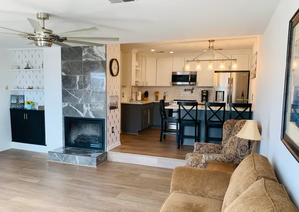 a dining room with furniture and window