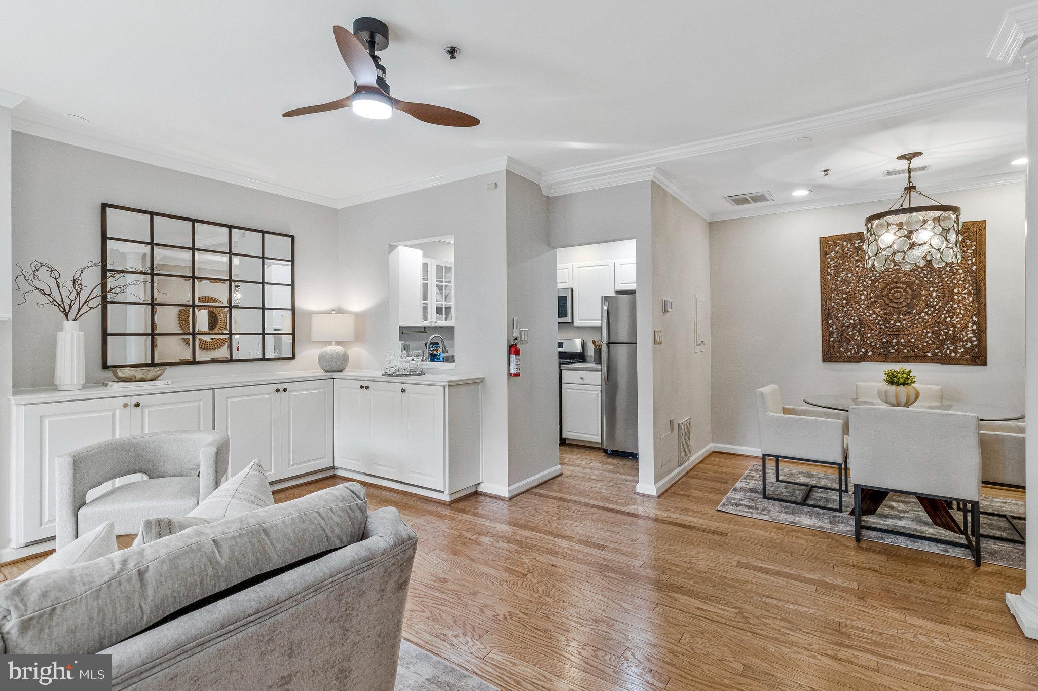 2413 20th Street Northwest, Unit 1 Washington, DC 20009 - Photo 11 of 31 a living room with furniture and a wooden floor