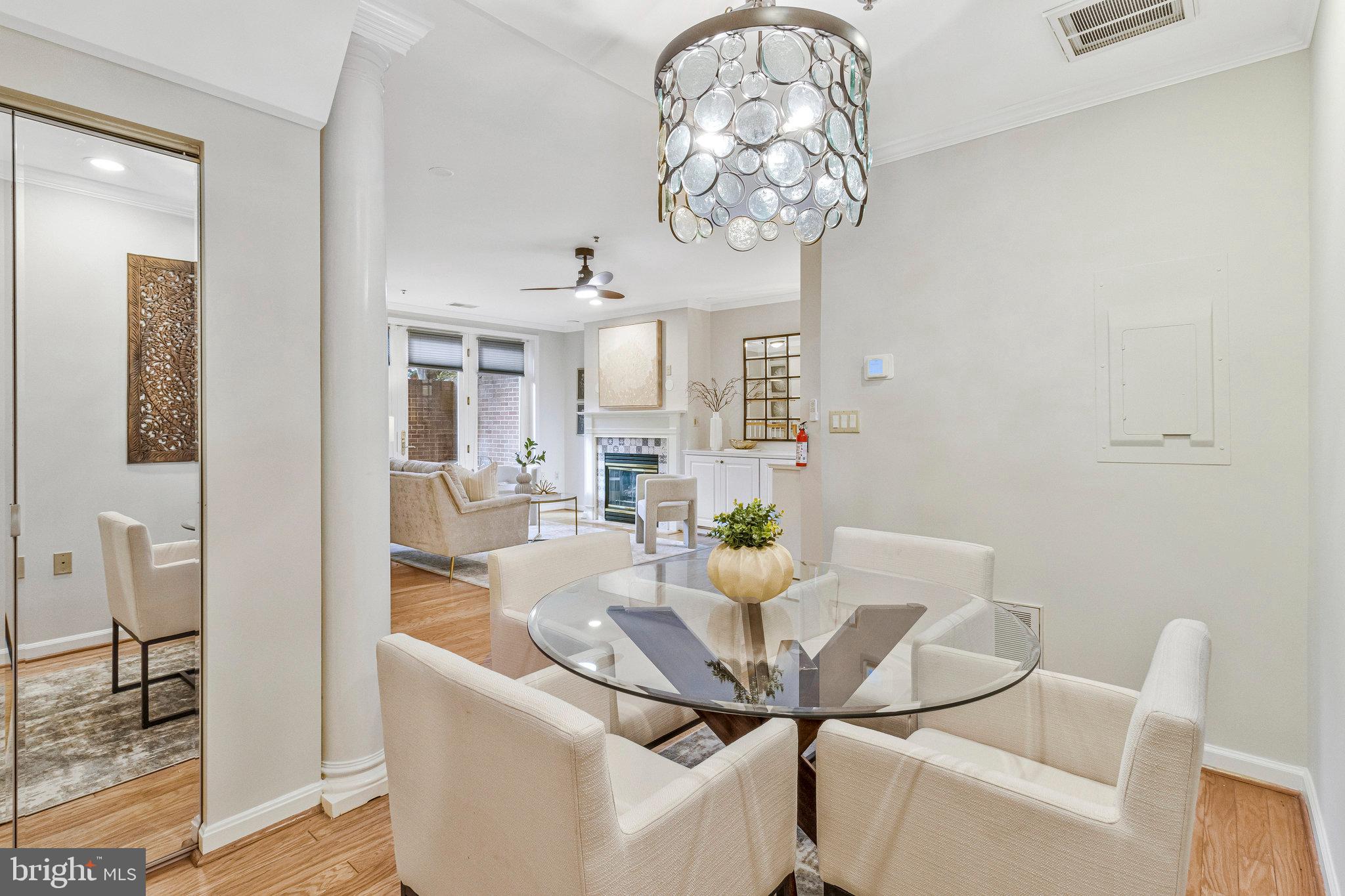 2413 20th Street Northwest, Unit 1 Washington, DC 20009 - Photo 12 of 31 a view of a dining room with furniture and chandelier
