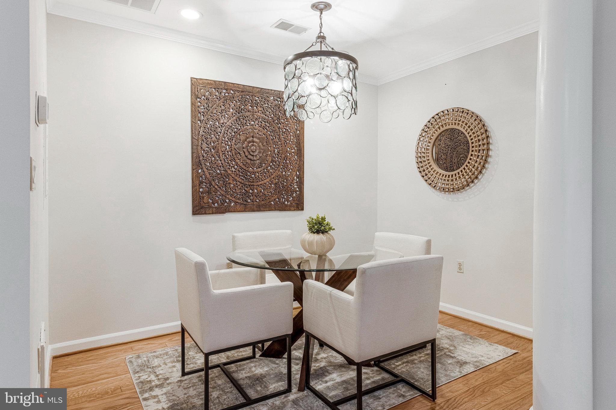 2413 20th Street Northwest, Unit 1 Washington, DC 20009 - Photo 13 of 31 a dining room with furniture and wooden floor