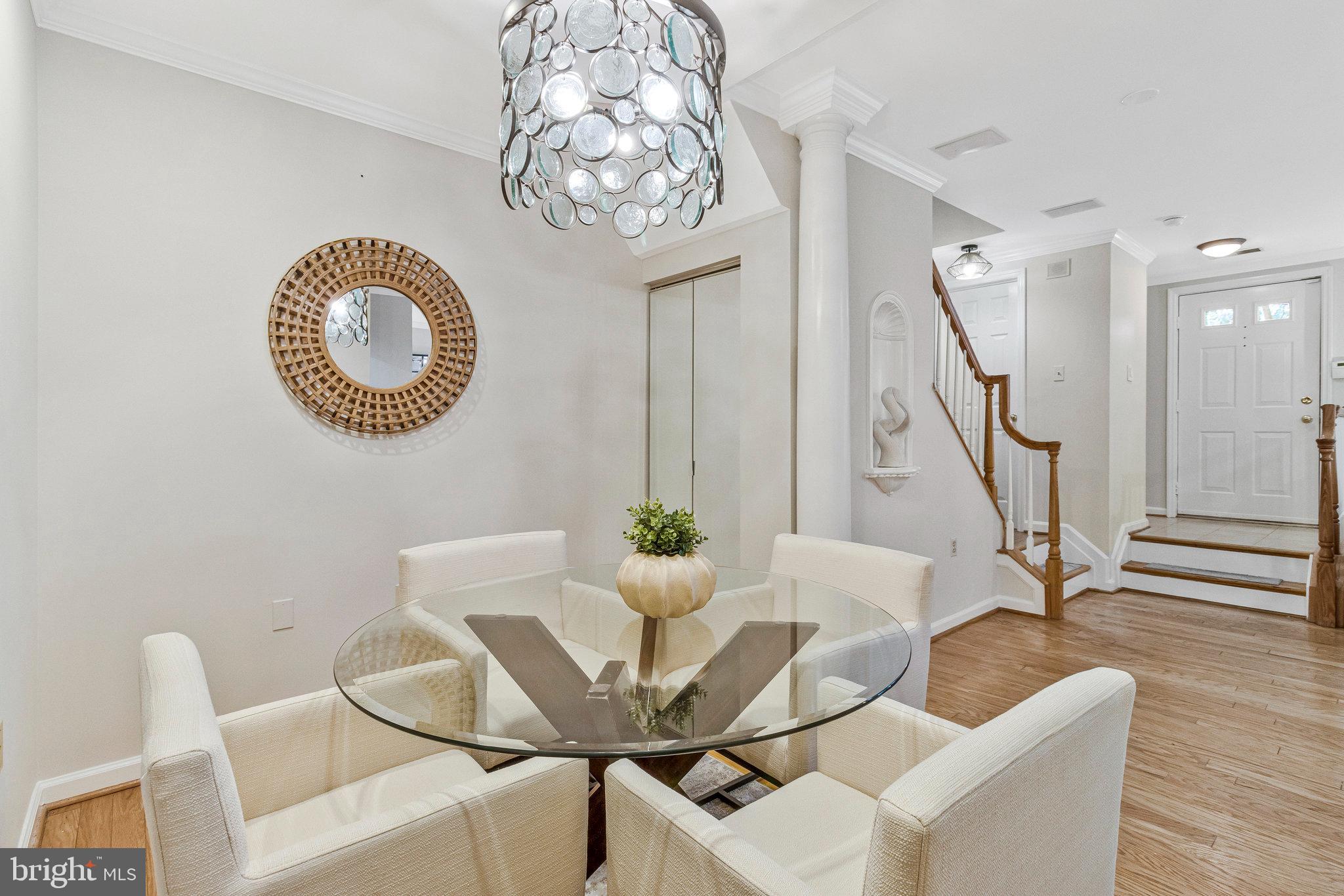 2413 20th Street Northwest, Unit 1 Washington, DC 20009 - Photo 14 of 31 a view of a dining room with furniture and wooden floor