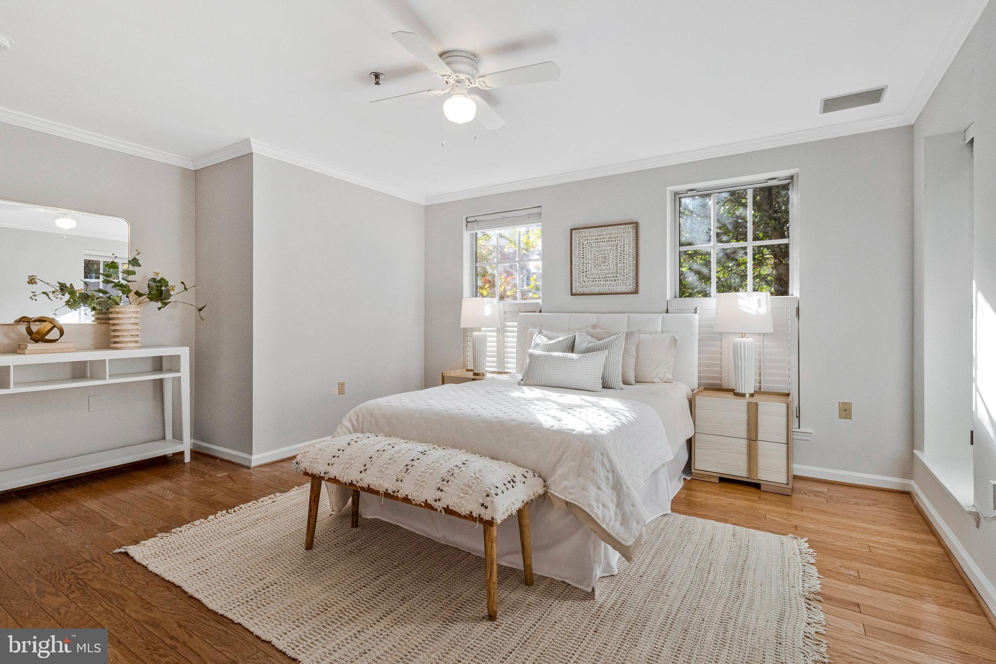 2413 20th Street Northwest, Unit 1 Washington, DC 20009 - Photo 22 of 31 a bedroom with a bed and a dresser