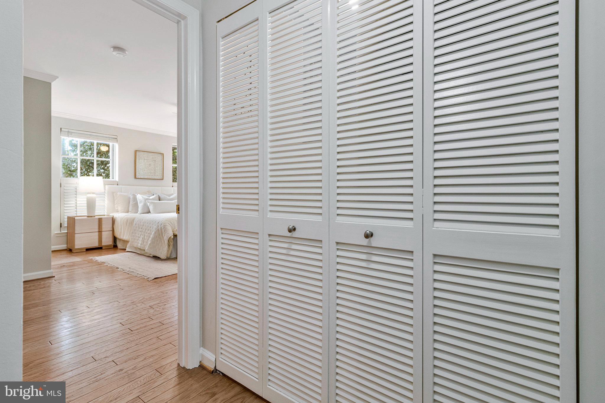 2413 20th Street Northwest, Unit 1 Washington, DC 20009 - Photo 27 of 31 a view of a bedroom with a bed and a large window