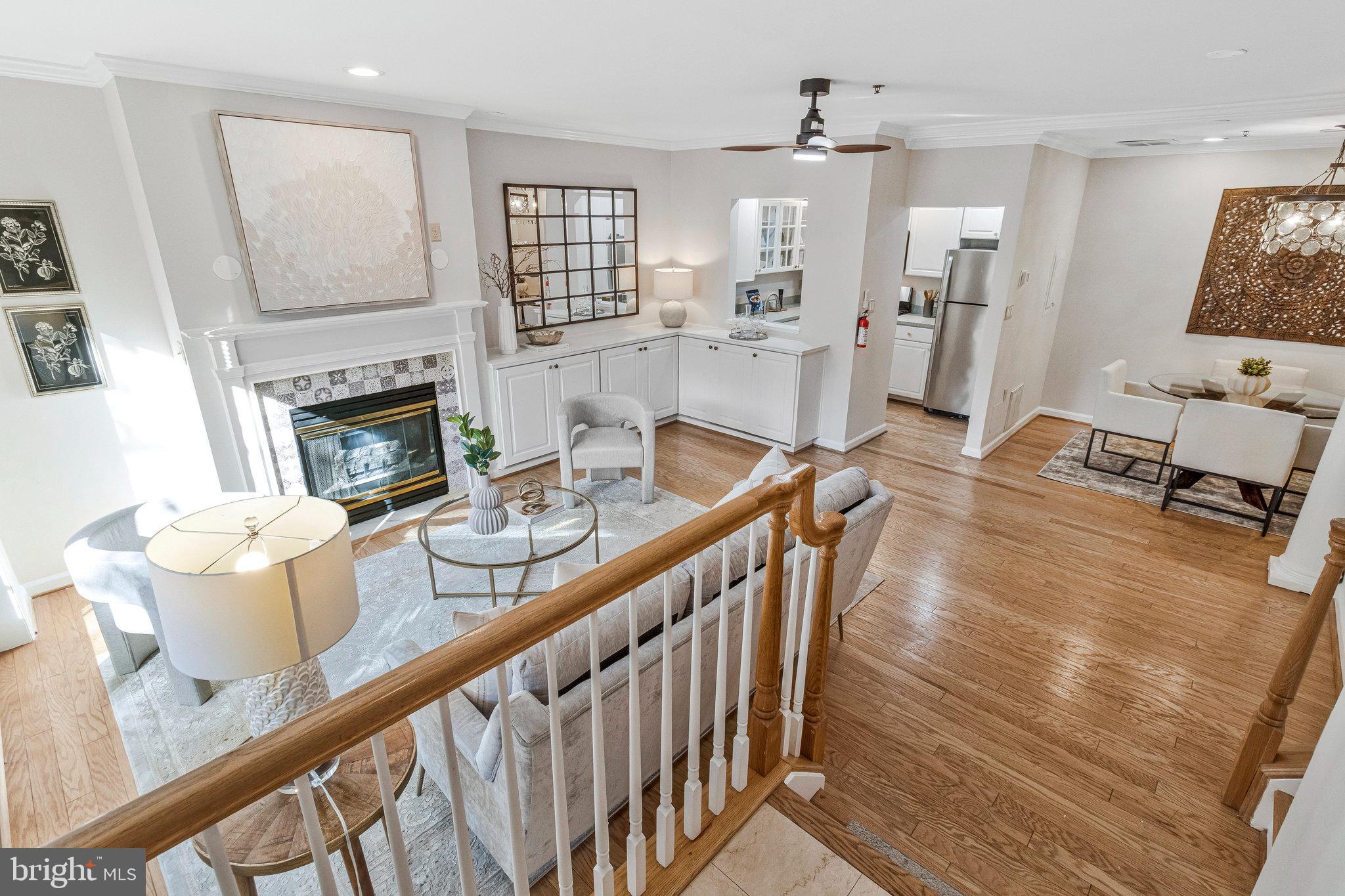 2413 20th Street Northwest, Unit 1 Washington, DC 20009 - Photo 6 of 31 a dining room with furniture a fireplace and wooden floor