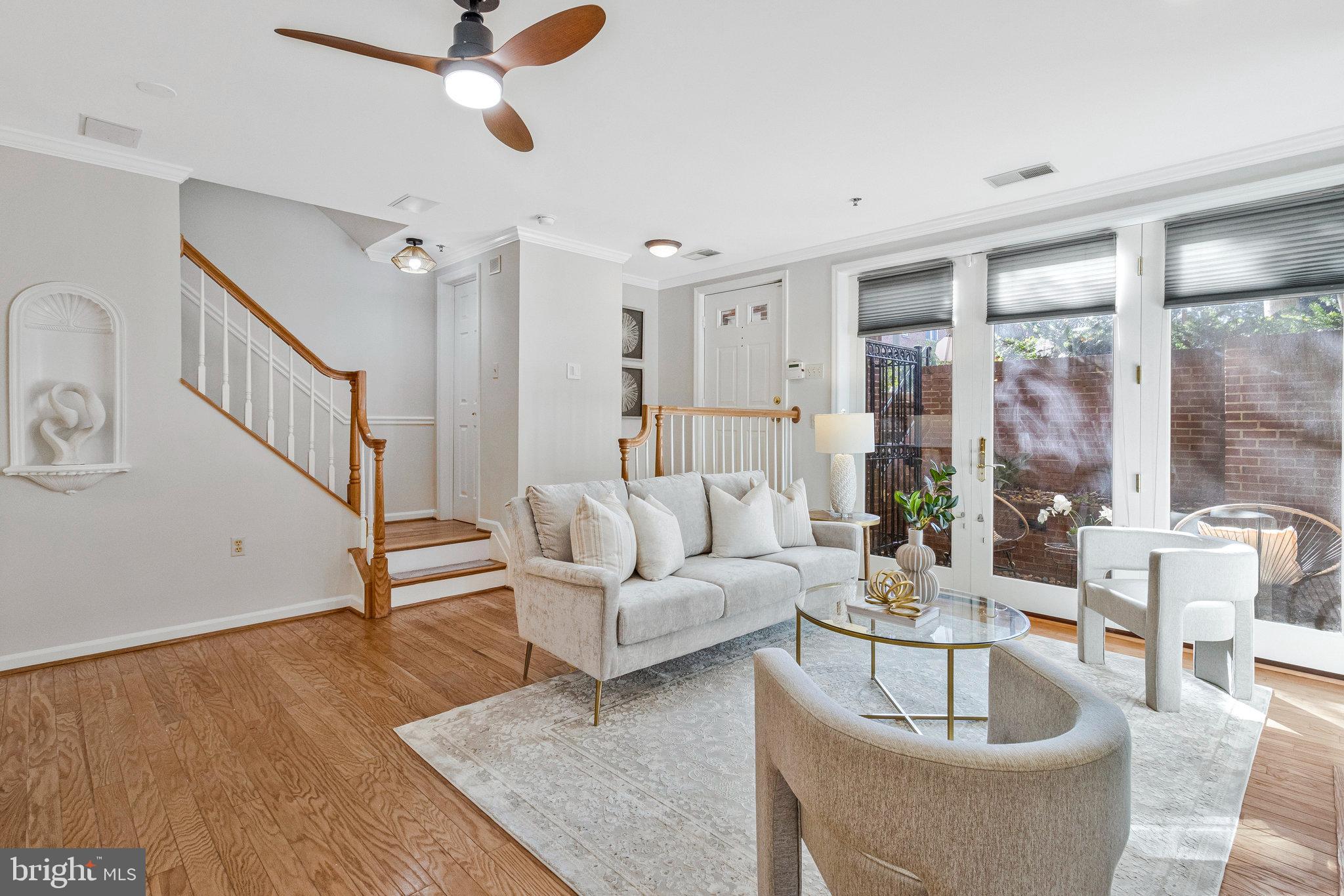 2413 20th Street Northwest, Unit 1 Washington, DC 20009 - Photo 7 of 31 a living room with furniture and a wooden floor