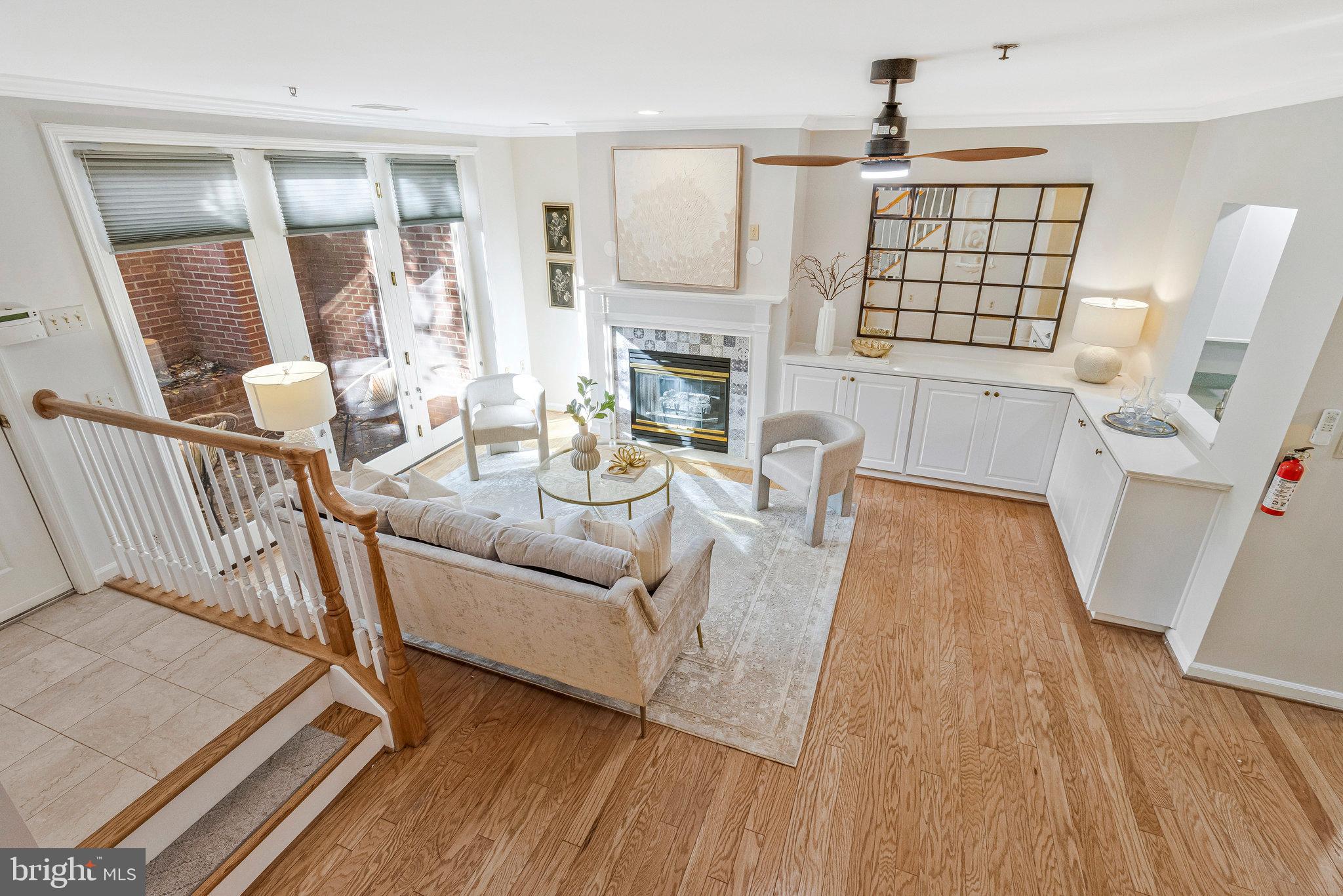 2413 20th Street Northwest, Unit 1 Washington, DC 20009 - Photo 10 of 31 a living room with furniture fireplace and wooden floor