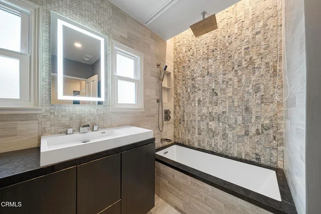 a bathroom with a sink and a bathtub