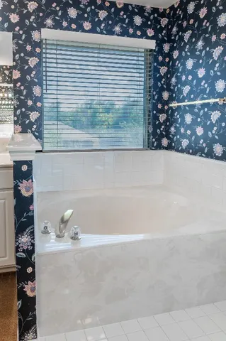a view of a bathtub in a window