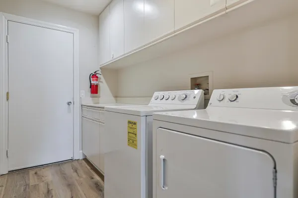 a utility room with dryer and washer