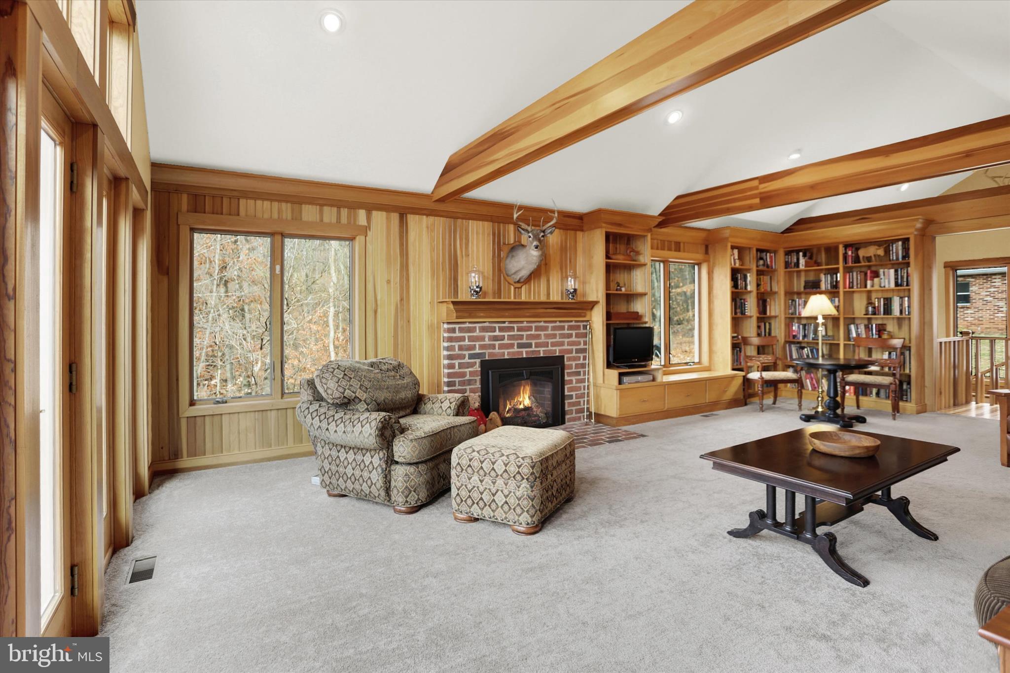 920 Cola Road Middletown, PA 17057 - Photo 48 of 134 Living room with beamed ceiling, fp, bookshelves