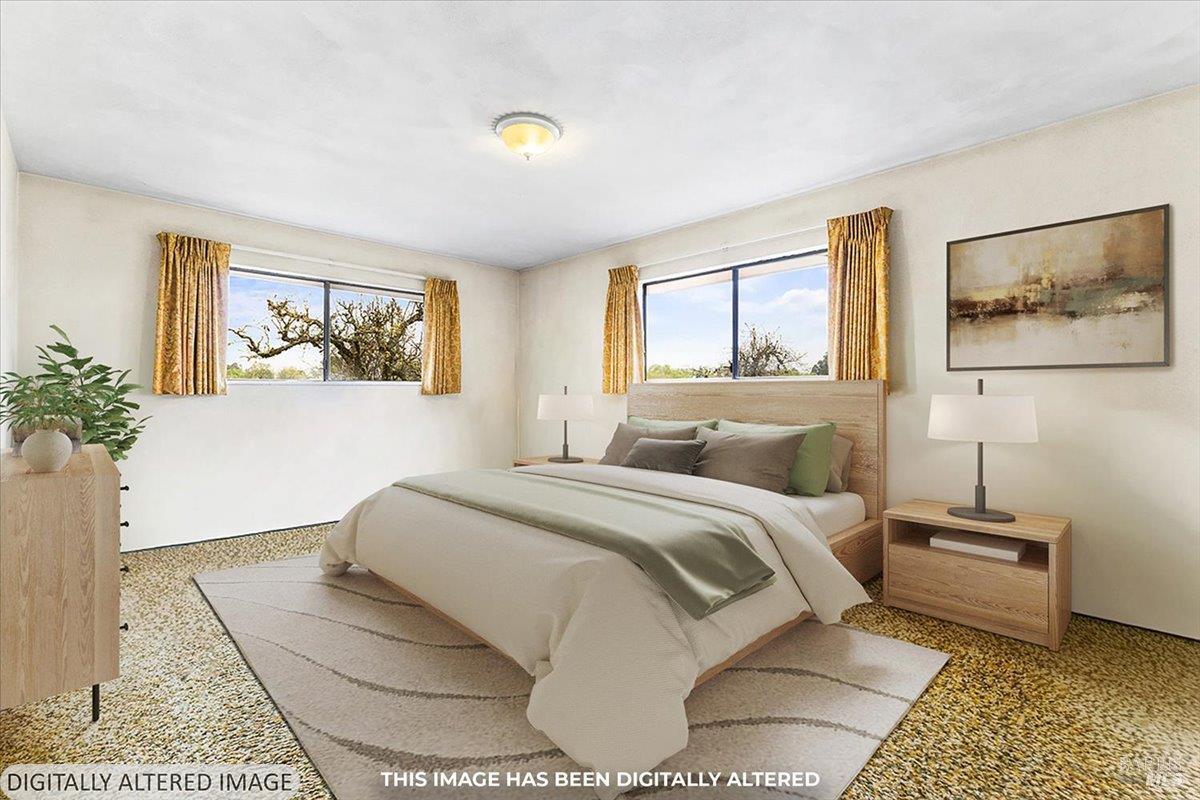 2062 Woolsey Road Fulton, CA 95439 - Photo 18 of 44 a bedroom with a bed and a painting on the wall